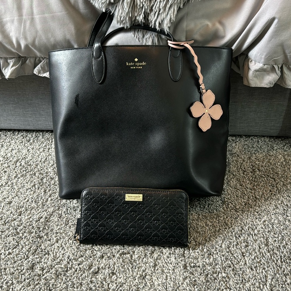 Black Kate spade tote and wallet.